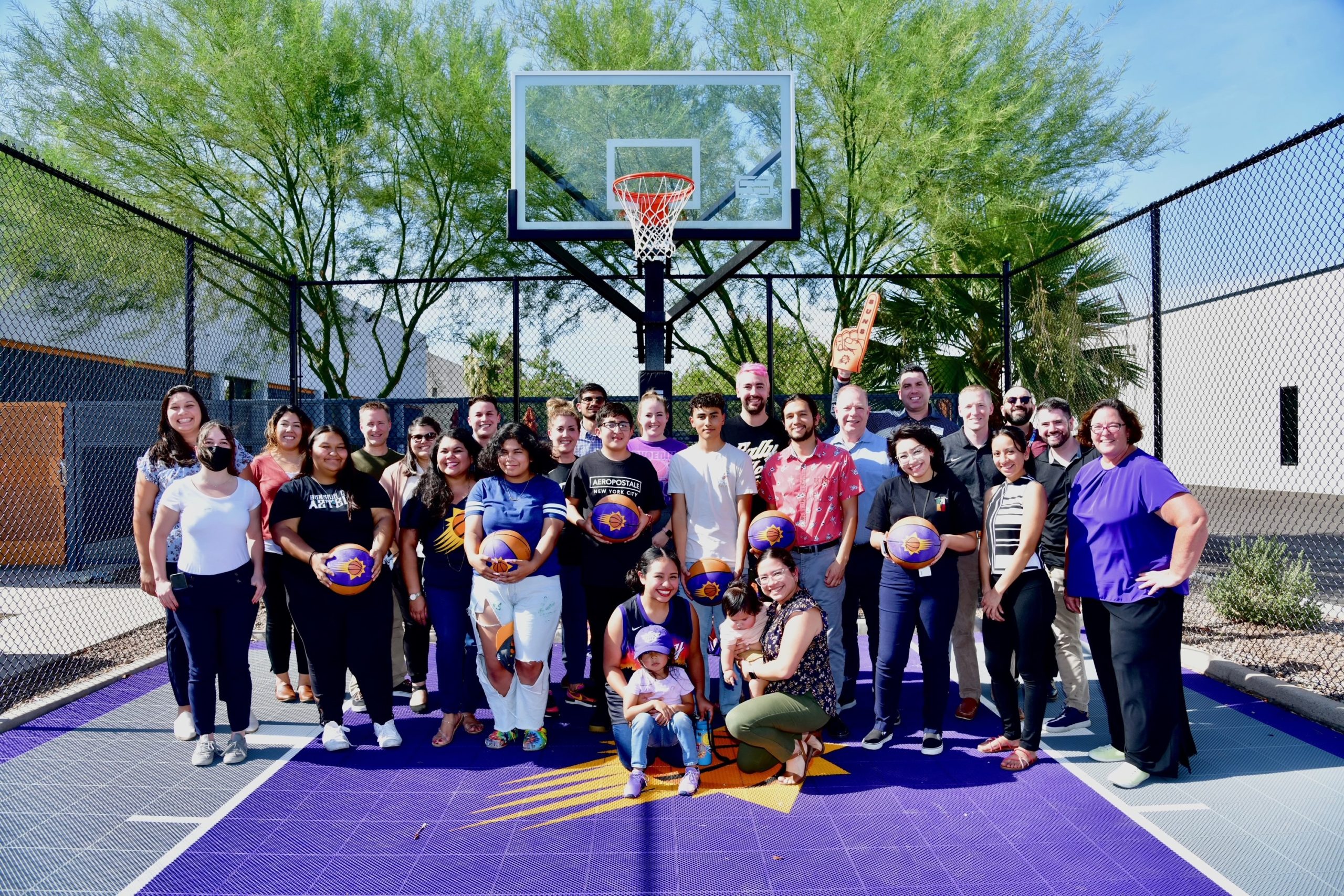 New Pathways for Youth celebrates the donation of a new basketball court from the Phoenix Suns and NBA, bringing together youth, mentors, staff, and community partners.